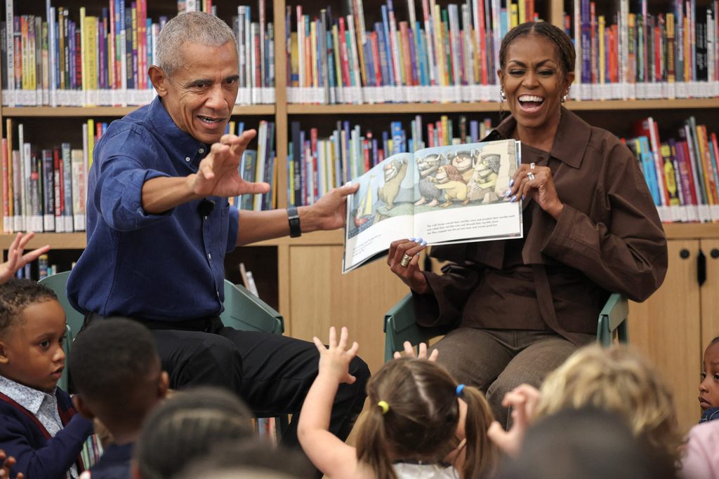 Former US president Barack Obama and former first lady Michelle Obama read Maurice Sendak's 'Where The Wild Things Are' to school children at the Barack Obama Presidential Center, in Chicago, Illinois, on June 19, 2026.