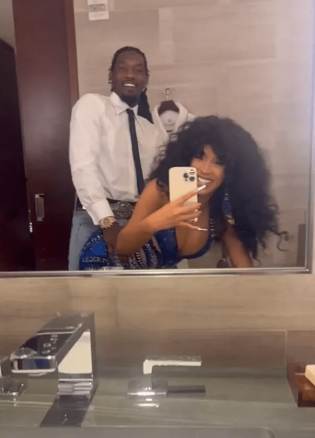 Mirror selfie of Cardi B and Offset simulating sex.
