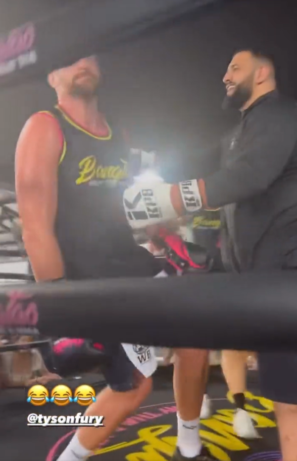 Fury paused before pretending to go weak at the knees