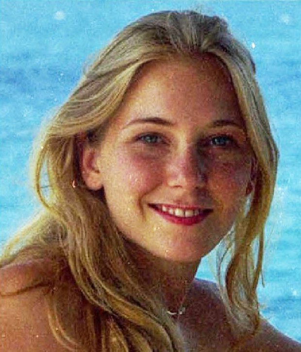 Portrait of a young woman with long blonde hair.