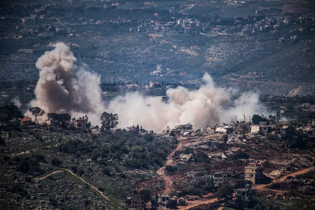 Smoke rises from a village in southern Lebanon as the Israeli army operates in it as seen from the Israeli side of the border