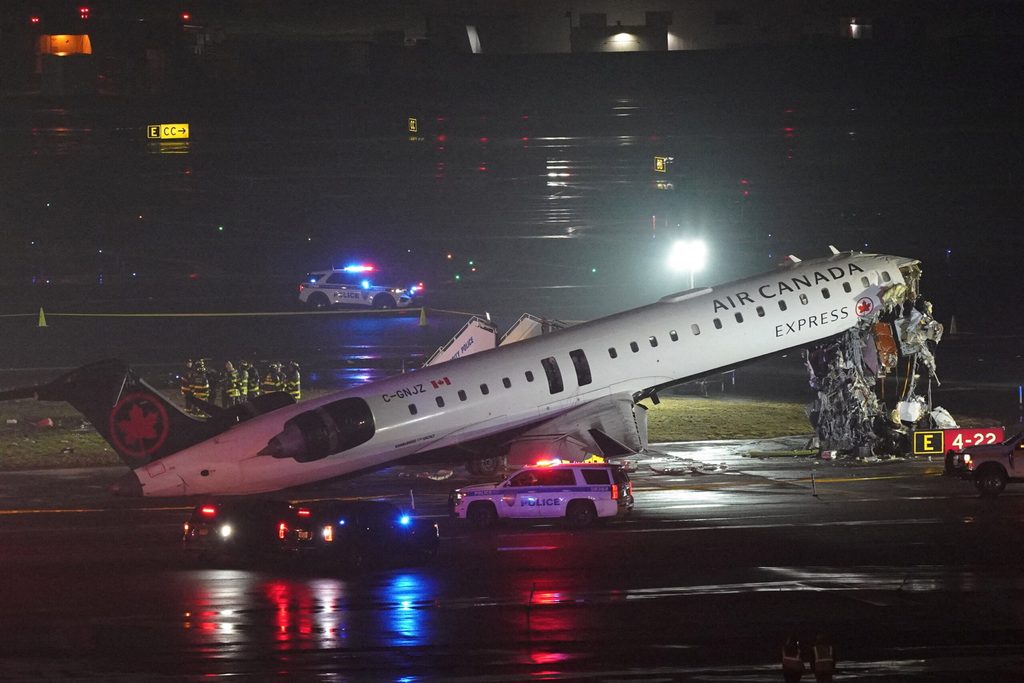 Air Canada Express jet collides with a ground vehicle at LaGuardia airport