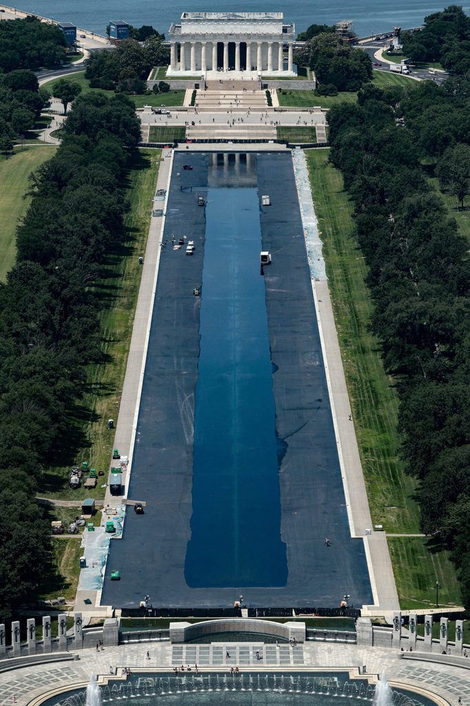 Workers refill the Lincoln Memorial Reflecting Pool in Washington