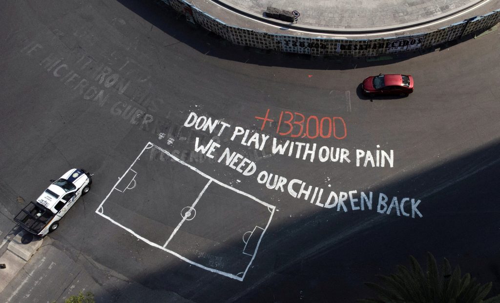 A drone view shows a message by members of missing-person search groups ahead of 2026 World Cup, in Mexico City