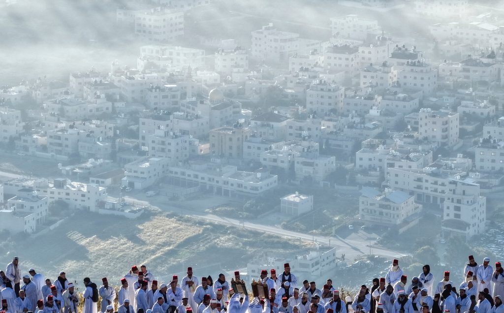 Members of the Samaritan sect take part in a traditional pilgrimage atop Mount Gerizim, ahead of the holiday of Shavuot, in Nablus