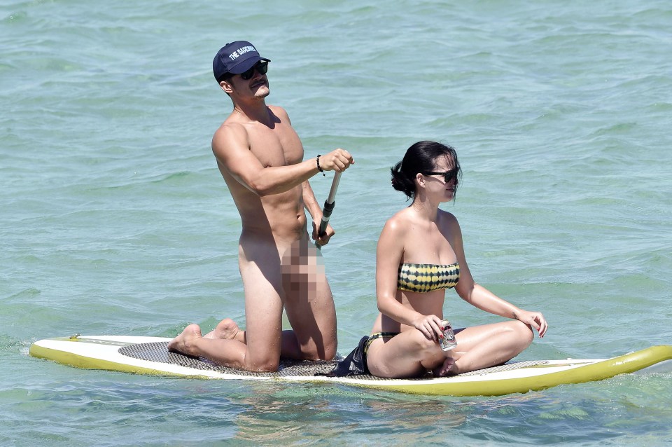 Orlando Bloom and Katy Perry paddleboarding in Sardinia.