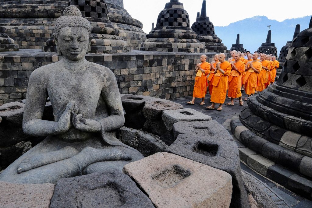 Buddhist monks take part in a circumambulation ritual at Borobudur Temple, the world's largest Buddhist temple, ahead of Vesak Day, marking the birth, enlightenment, and death of Buddha, in Magelang