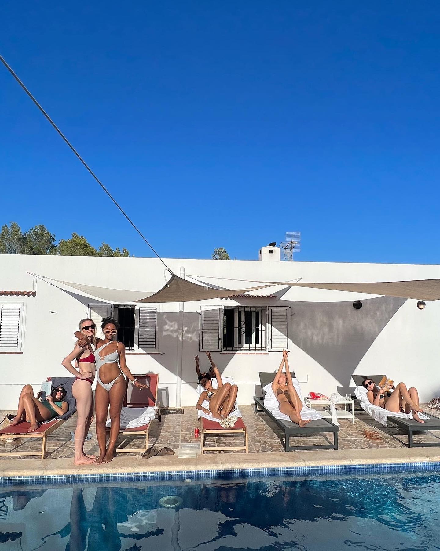 Naomi and her friends hung out by the pool