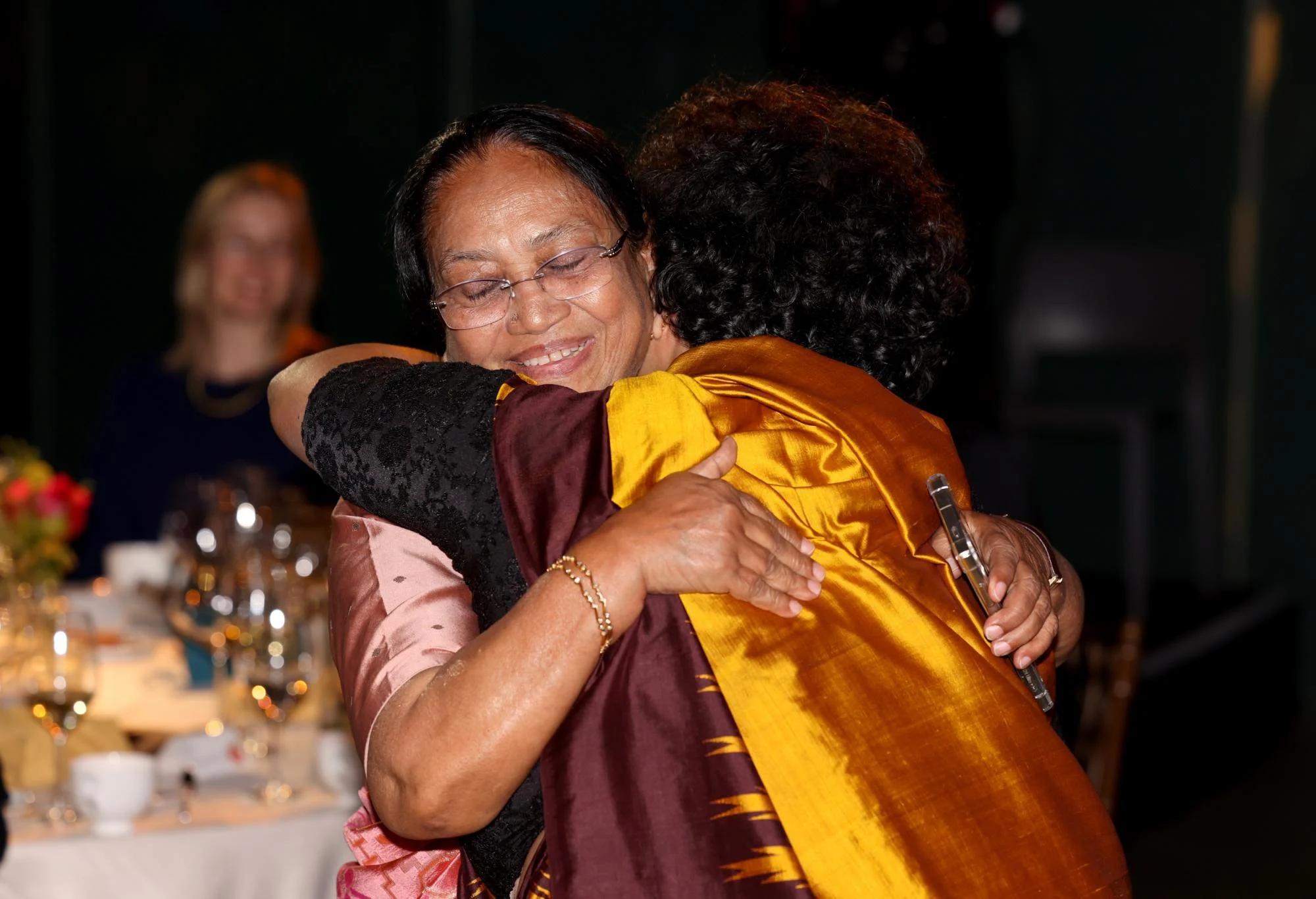 Banu Mushtaq hugs translator Deepa Bhasthi after they are announced winners. Photo by David Parry for the Booker Prize Foundation.
